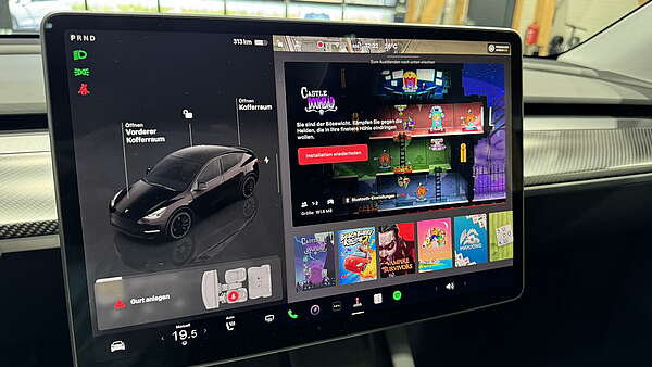Tesla Model Y Performance All Black & Carbon Foto 33